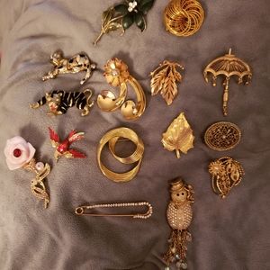 Lot of 64 vintage brooches